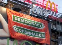 Have a watch of our banner action from the 17th December in Copenhagen's central square. The police scrambled a helicopter and brought 20 police and 3 vans down to arrest our two climbers. They were released the following day. The banner drop was covered as breaking news live on Danish DR channel who were in the square at the time. The COP15 process is not democratic. Until we have negotiations that are, we will never reach just or sustainable agreements on climate change or any other g